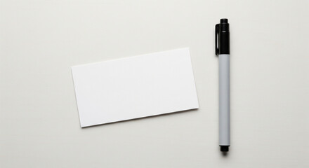 Top‑down of blank name tag with plain pen before writing