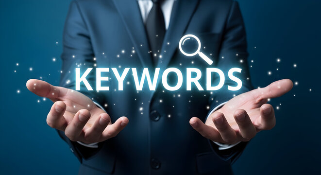 Businessman presents glowing keywords concept with a magnifying glass icon symbolizing search engine optimization and digital marketing strategies for online visibility and content discovery success - Powered by Adobe