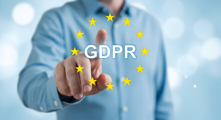 Man touches gdpr text surrounded by eu stars on a blue background representing data protection and privacy compliance with european union regulations and general data protection regulation