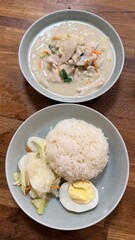 Utensils, Napkin, and Water Glass on Wooden Table