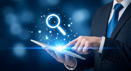 Businessman in a suit uses a digital tablet with a magnifying glass icon representing search analysis and data exploration in a modern technologydriven business environment for success