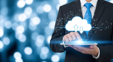 Businessman interacts with cloud computing technology on a tablet showcasing data transfer and network connectivity in a modern digital environment with a bokeh background for business solutions