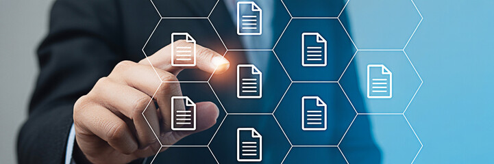 Business professional interacts with digital document icons on a virtual interface showcasing data management and workflow automation in a modern technology environment for enhanced productivity