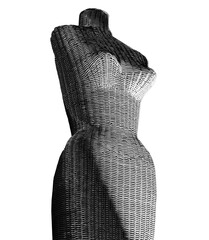 Fashion model  made of wicker shows sculpted attractive female body with plenty of curves. This is a bodice style mannequin.
