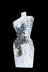 Mosaic mannequin  model looks attractive  as if wearing a fanciful dress. Design is mosaic segments.