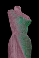 Female mannequin in pink red green design. Fashion model is wicker.