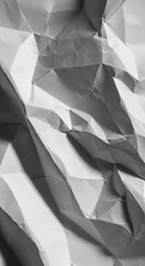 Close-up abstract background showing deeply crumpled white paper with harsh shadows, resulting in a complex, chaotic, and rough pattern ,complex ,texture ,structure