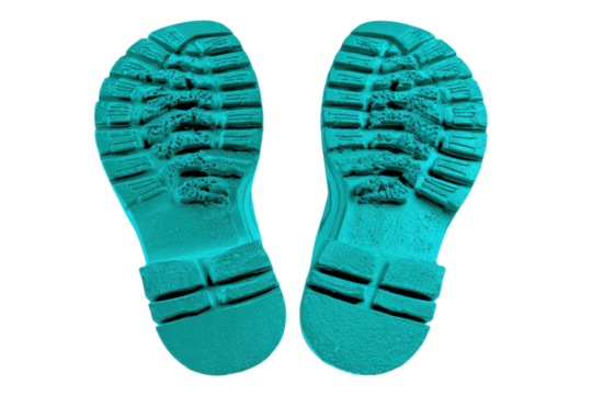 Two teal boot soles with deep tread patterns on black background footwear, Isolated On Transparent Background, Png Cut Out