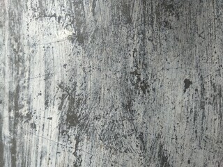 Photo of a gray and white wall with an abstract pattern