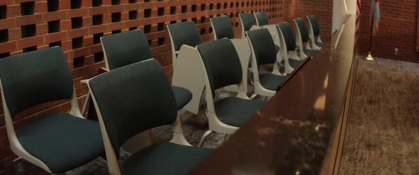 Part of a series of shots inside an empty United States public courtroom. Themes of justice, trial, crime and law. Filmed with anamorphic lenses in 2.39:1 scope ratio.