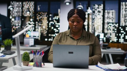 Diverse employees engaged in business intel and analytics using data diagrams in a corporate office, coworkers review projections and reports to improve overall company strategy. Camera B. - Powered by Adobe