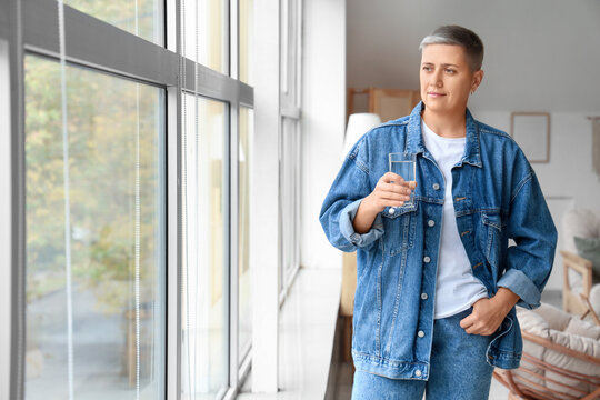 Young woman with short hair at home