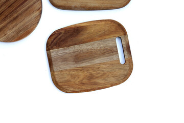 Wooden cutting board on white background.