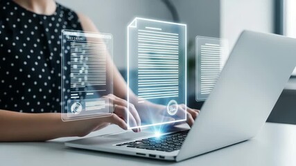 Woman typing on laptop with glowing digital documents and data interfaces emerging from screen - Powered by Adobe