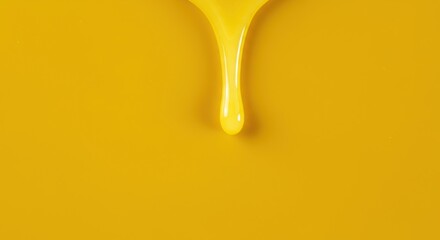 Close up shot of glistening melted butter dripping down a golden yellow surface creating rich texture and warm inviting colors perfect for recipes ,background ,appetizing ,gold