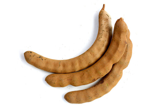 Fresh tamarind on a white background.