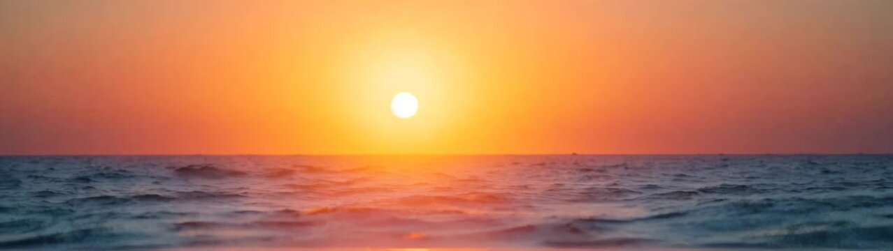 View of a sunset over the ocean with waves