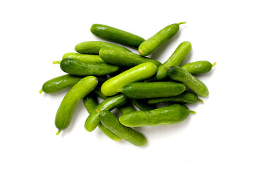 Fresh mini baby cucumbers on white background