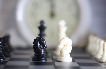 chess pieces on the chess board artistic background game playing competition	
