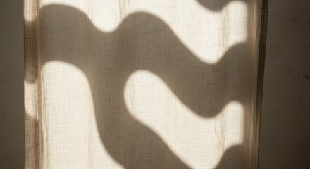 Wavy shadow patterns cast by fabric or curtain, creating organic and flowing shapes