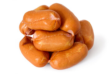A pile of thick short sausages on a white background. Lots of natural meat sausages