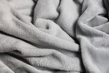 Ultra-soft, plush grey faux fur fabric, ideal for cozy textures, comfortable blankets, wallpaper, lifestyle design, and luxurious backgrounds. © Ink N Propeller