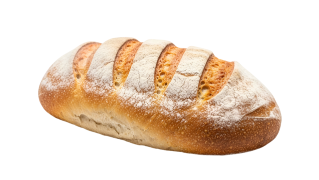 Oval rustic loaf dusted with white flour sits isolated against a solid black background
