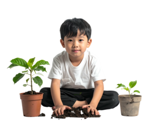 A young boy, sitting cross-legged, smiles while surrounded by plants and soil against a black background