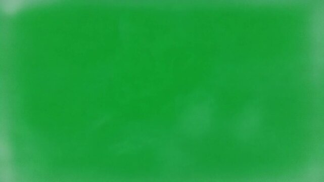 A vibrant green background with subtle variations in tone.