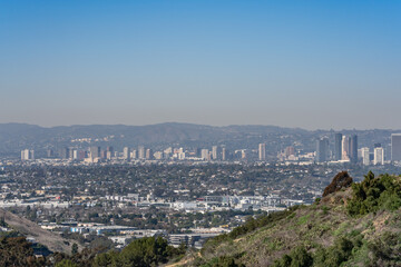 Obraz premium In the distance are Westwood (Los Angeles) and the Santa Monica Mountains. Kenneth Hahn State Recreation Area, Baldwin Hills Mountains of Los Angeles California