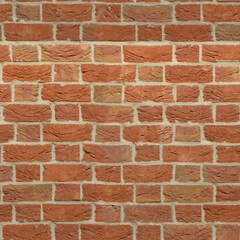 Obraz premium Rustic Textured Brick Wall Detail Reddish Brown Surface Material