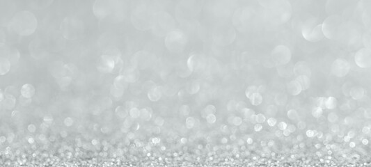 Abstract silver glitter sparkle texture with bokeh background