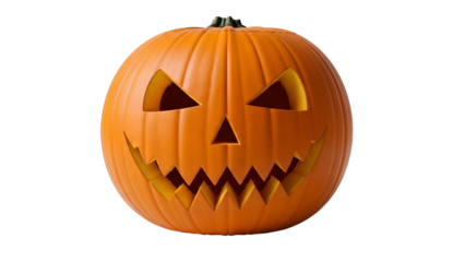 Glowing carved pumpkin faces a dark background with ample copy space