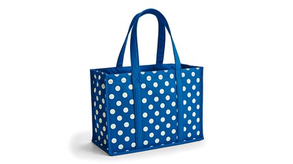 Blue tote bag with white polka dot pattern on isolated background

