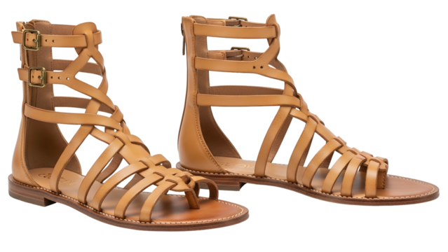 A pair of tan leather caged gladiator sandals with adjustable straps displayed against a black background