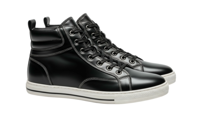 Polished leather high top athletic footwear rests against a dark background