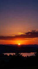 A breathtaking scenic view during the golden hour, featuring deep orange and purple twilight skies and dark, peaceful nature silhouettes, majestic, reflection, goldenhour