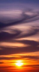 Fototapeta premium Abstract nature background showing a powerful sunset lighting up dark, textured clouds in a stunning, colorful display of atmospheric drama, tranquil, epic, background