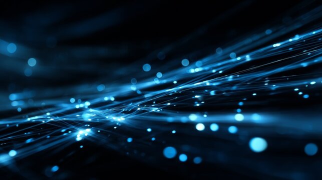Blue glowing light trails and particles moving through dark background, abstract digital motion design symbolizing data flow and futuristic technology
