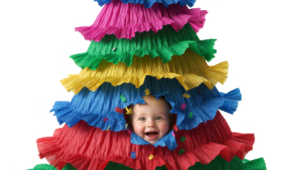 Cute Baby Girl Breaking Through a Colorful Piñata