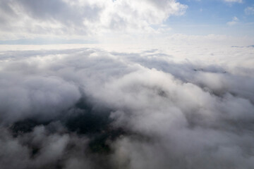 Landscape of Morning Mist with Mountain Layer. mountain ridge and clouds in rural jungle bush forest