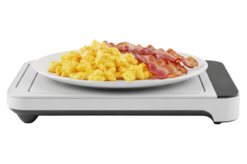 Plate of scrambled eggs and bacon on a modern food warmer isolated on transparent background