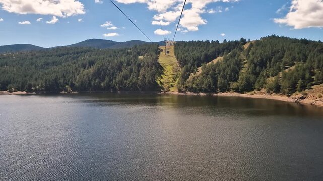 Ribnicko Lake View From Gold Gondola Lift on Zlatibor Mountain to Tornik Peak Serbia in Summer Season, Passenger Point of View 60fps