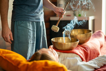 Tibetan singing bowls in sound therapy in spa center