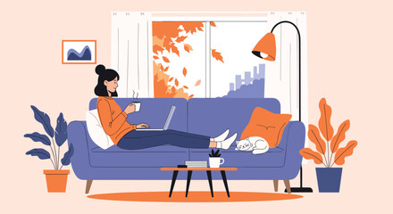 A woman relaxes on a cozy sofa at home, enjoying a warm drink while working on her laptop with a sleeping cat nearby, framed by an autumn window view.