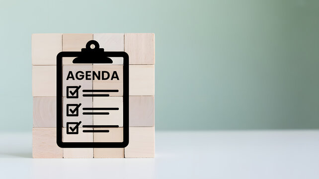 Effective planning with agenda icon on wooden blocks for professional success