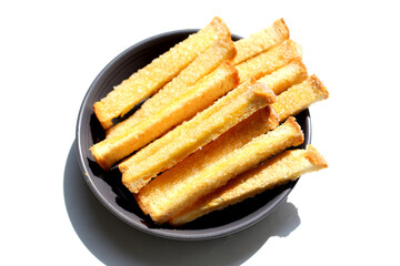 Sweet, sugar-coated crispy toast sticks.