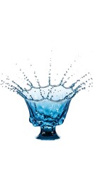 A dynamic splash of bright blue liquid erupting from a decorative glass bowl against a clean white background, captured in highspeed photography