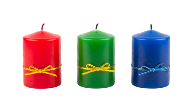 Three colorful pillar candles with yellow ribbon bows isolated on transparent background