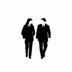Two business professionals walking together in silhouette.